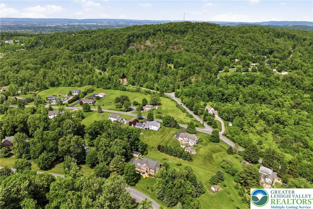 115 West Butternut Road Hellertown, PA 18055 - Photo 85 of 97 Perched on rolling hills, this neighborhood provides verdant views and abundant privacy.