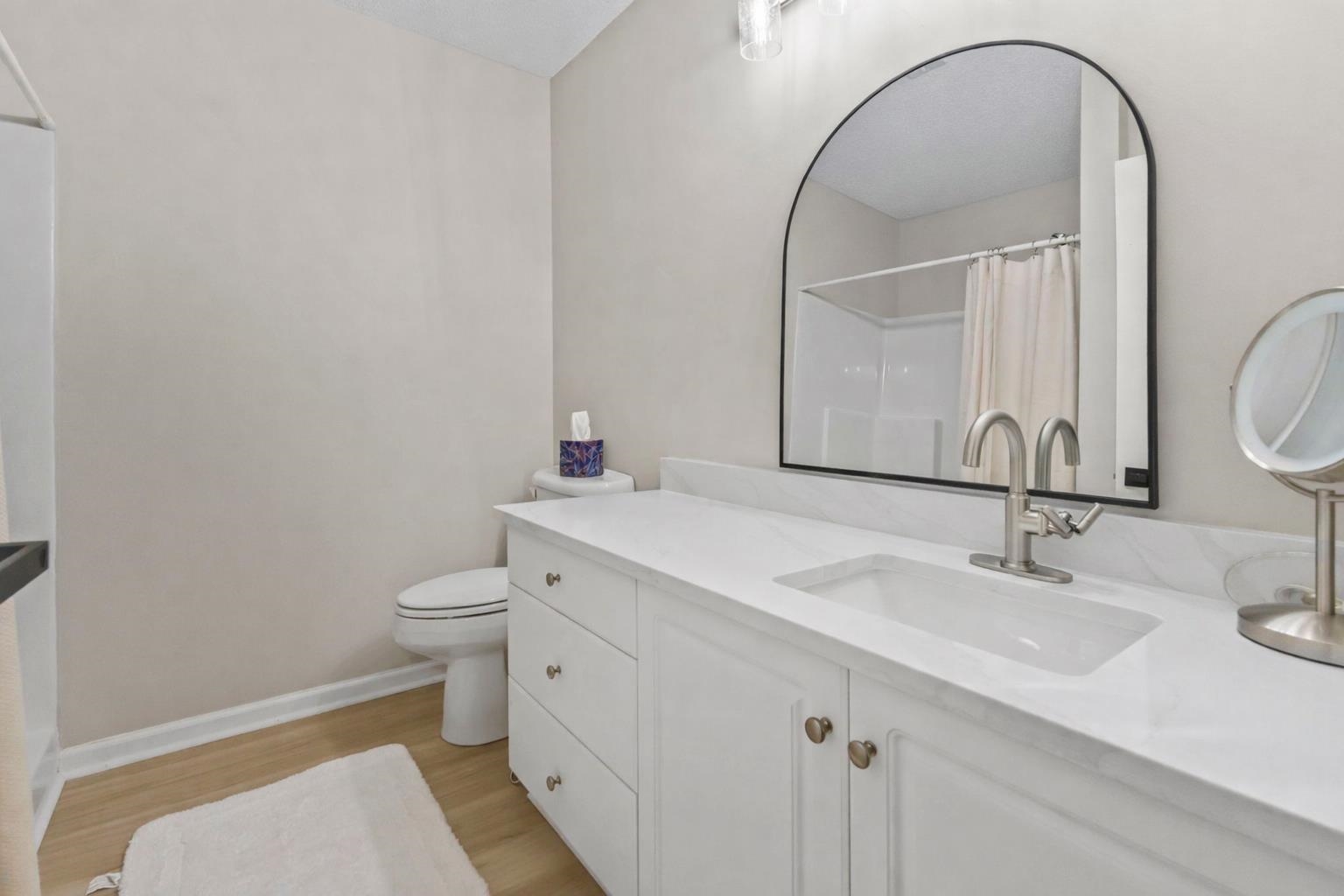 135 Country Manor Drive, Unit B Conway, SC 29526 - Photo 18 of 40 Bathroom featuring vanity, light wood-style floors, and a shower with curtain