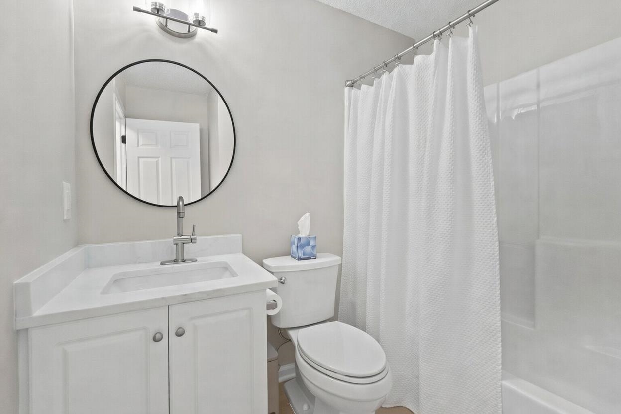 135 Country Manor Drive, Unit B Conway, SC 29526 - Photo 26 of 40 Bathroom featuring vanity and shower / bath combo with shower curtain