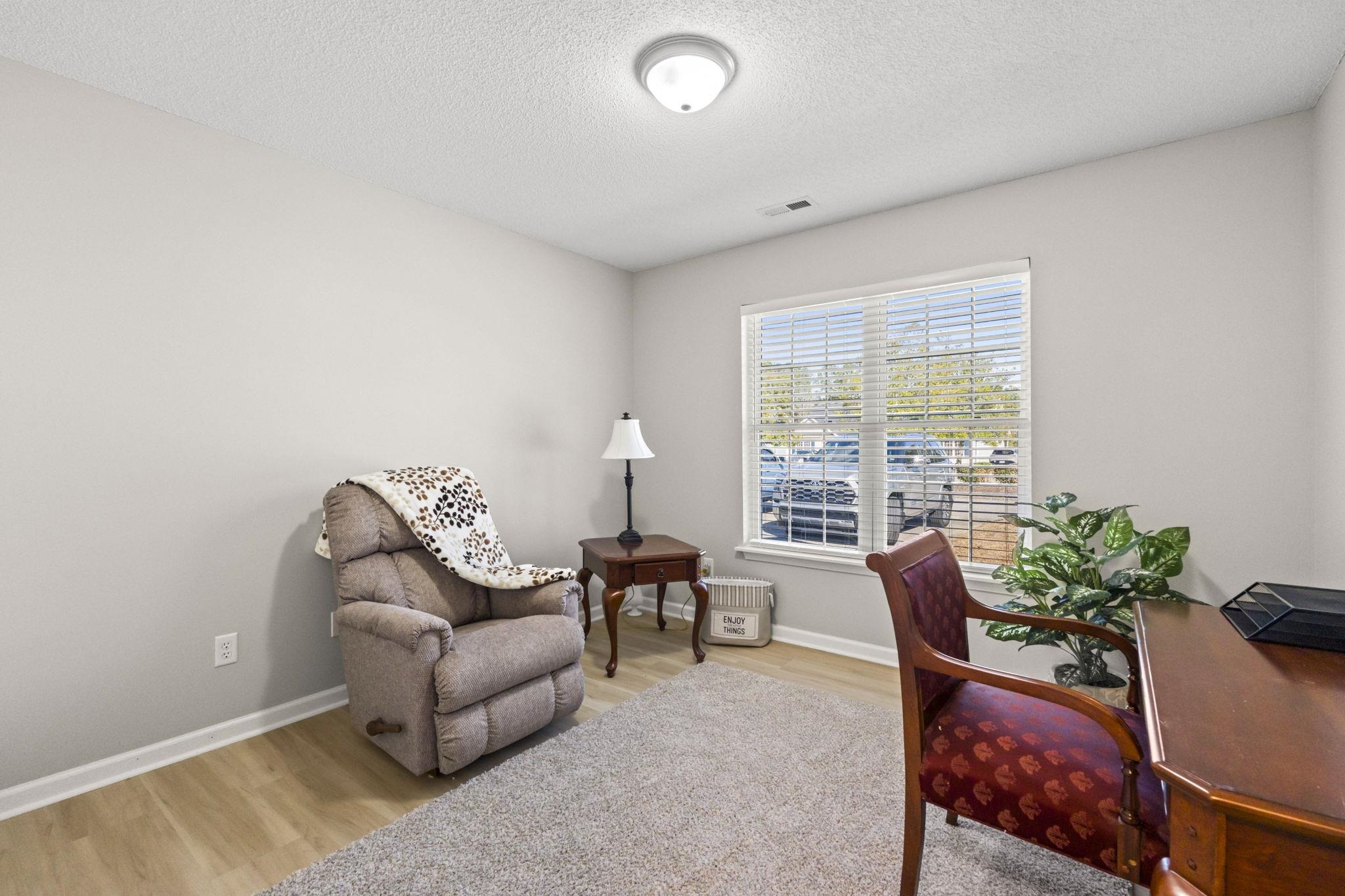 135 Country Manor Drive, Unit B Conway, SC 29526 - Photo 27 of 40 Office area with light wood-style floors and a textured ceiling