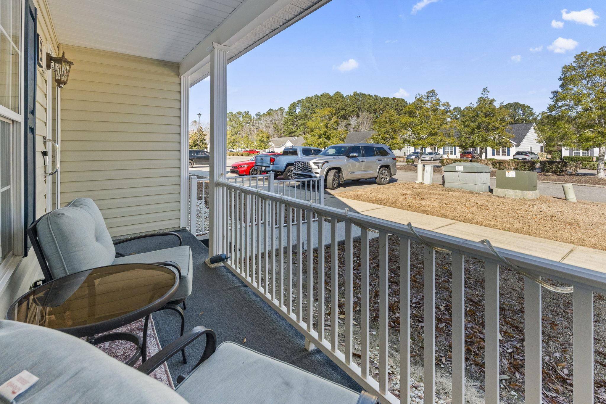 135 Country Manor Drive, Unit B Conway, SC 29526 - Photo 37 of 40 Covered porch with a residential view