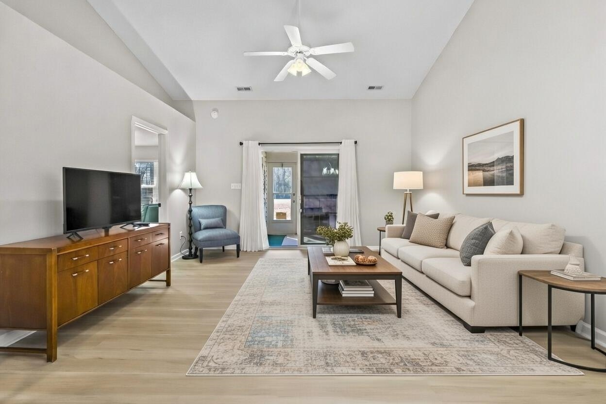 135 Country Manor Drive, Unit B Conway, SC 29526 - Photo 9 of 40 Living room with ceiling fan, light wood-style floors, and vaulted ceiling