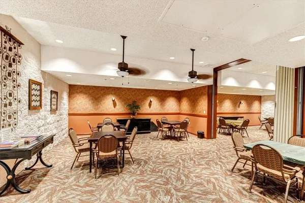 a kitchen with a table and chairs