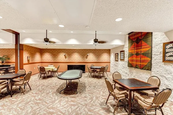 a view of a chairs and table in a room