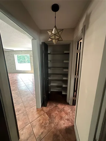 a view of entryway with a front door