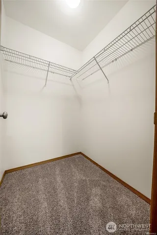 a view of a room with racks on the wall