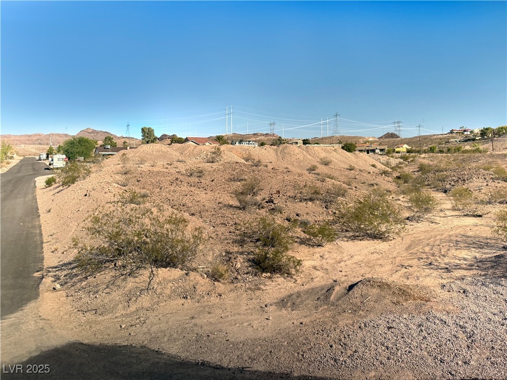 North North Milan Henderson, NV 89015 - Photo 2 of 11 View of yard from corner of Dublin and Milan