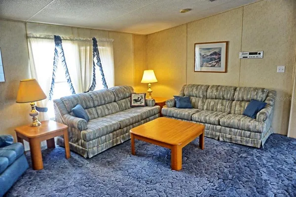 a living room with furniture and a couch