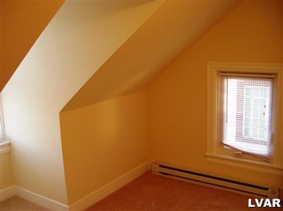706 East 5th Street Bethlehem, PA 18015 - Photo 9 of 9 a view of a small space with wooden floor and a window