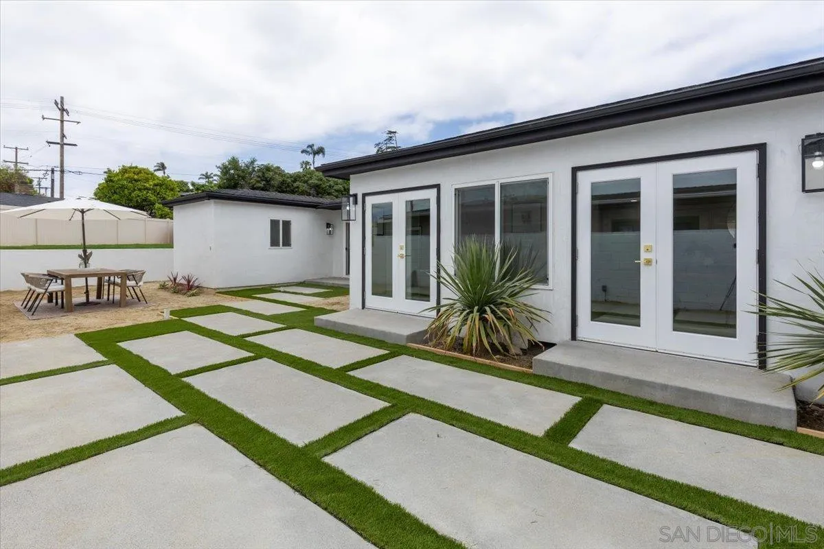 3663 Oleander Drive San Diego, CA 92106 - Photo 16 of 46 a view of a house with backyard and sitting area