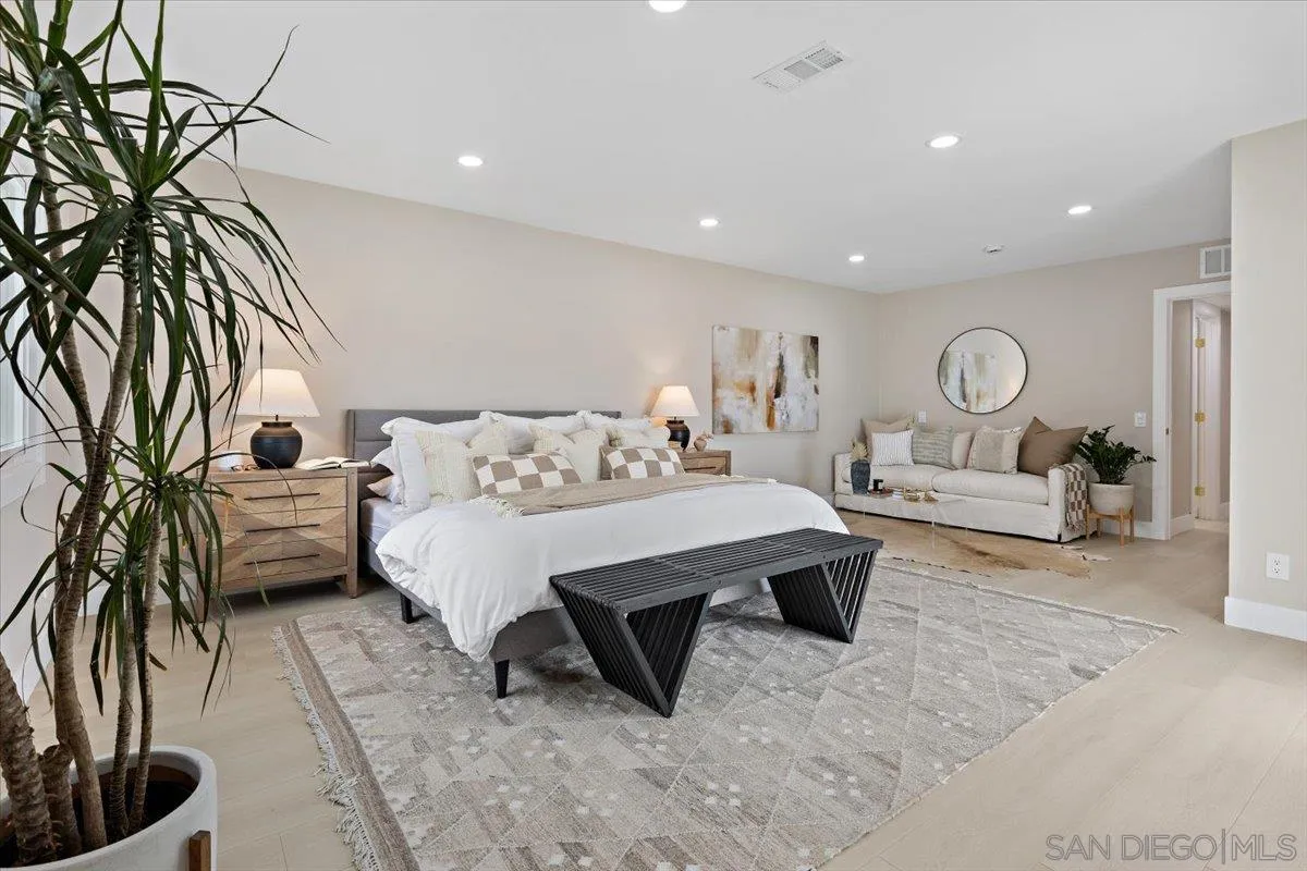 3663 Oleander Drive San Diego, CA 92106 - Photo 23 of 46 a bed room with furniture and a potted plant