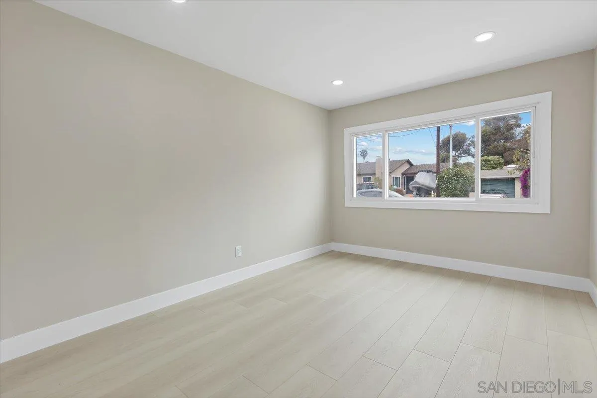 3663 Oleander Drive San Diego, CA 92106 - Photo 32 of 46 an empty room with windows