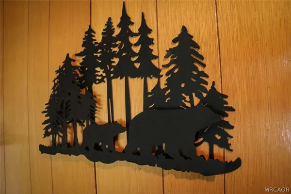 a kitchen with stainless steel appliances a stove a sink and a refrigerator