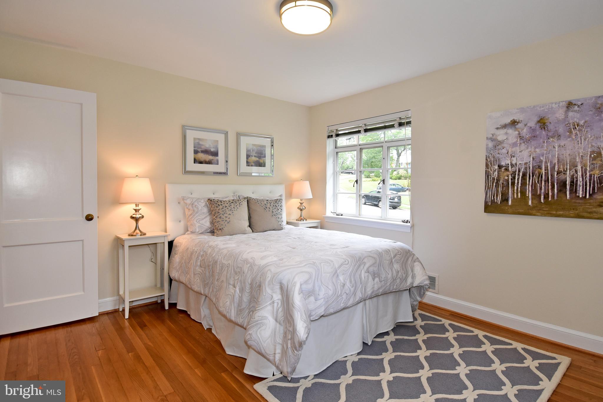 1404 Ruffner Road Alexandria, VA 22302 - Photo 18 of 34 a bedroom with a bed and a window