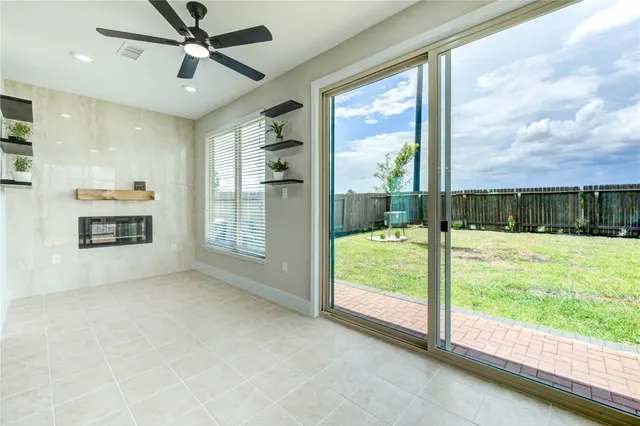 a view of a room with a large window