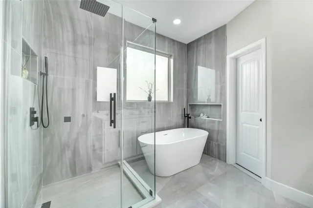 a bathroom with double sink and a mirror