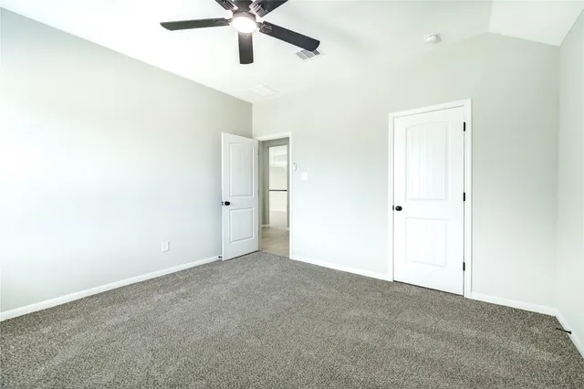 a bathroom with a sink toilet vanity and shower