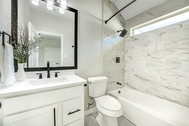 a swimming pool with a bench in front of it