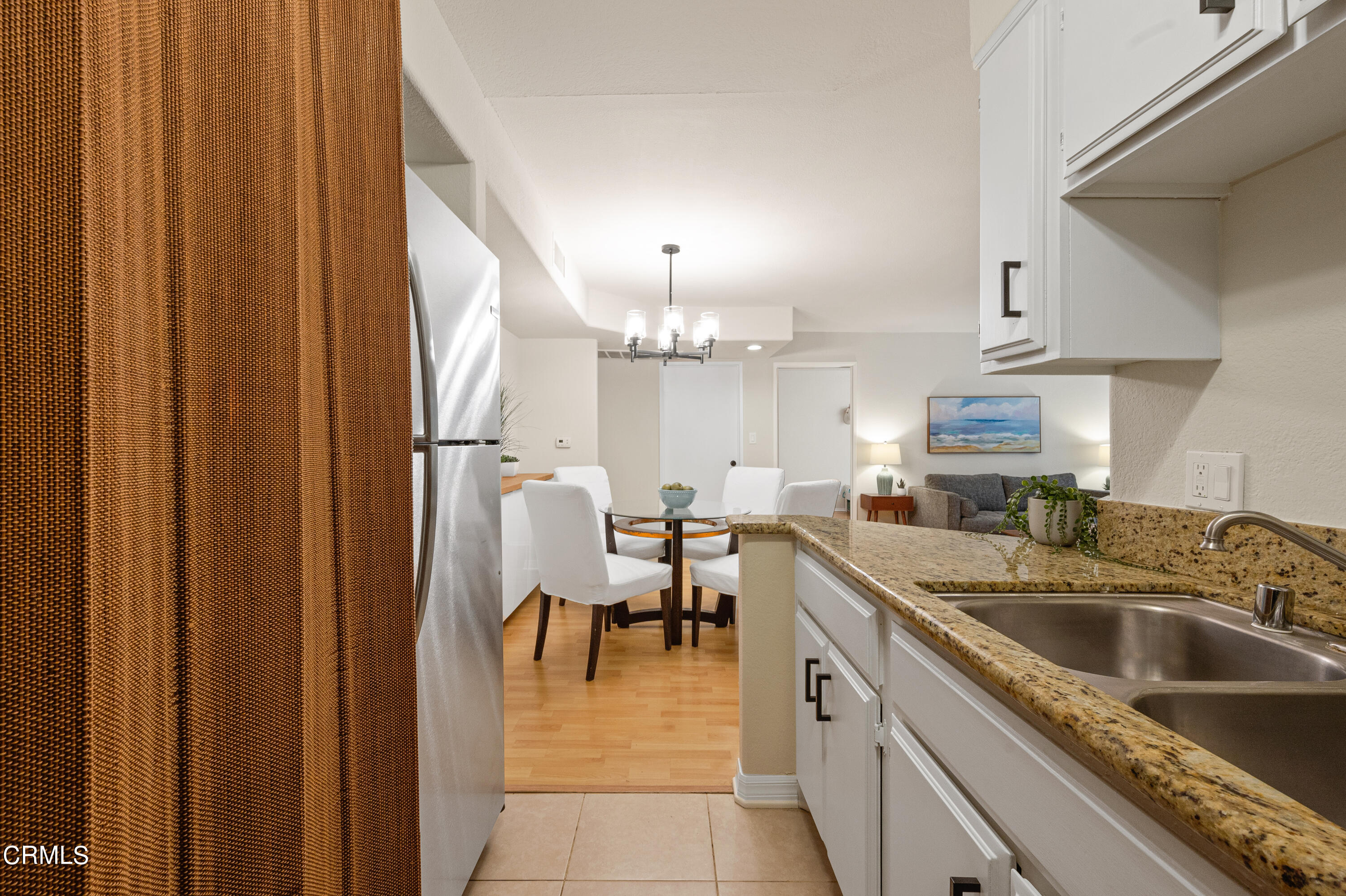 6140 Monterey Road, Unit 220 Los Angeles, CA 90042 - Photo 16 of 43 a kitchen with a sink cabinets and window