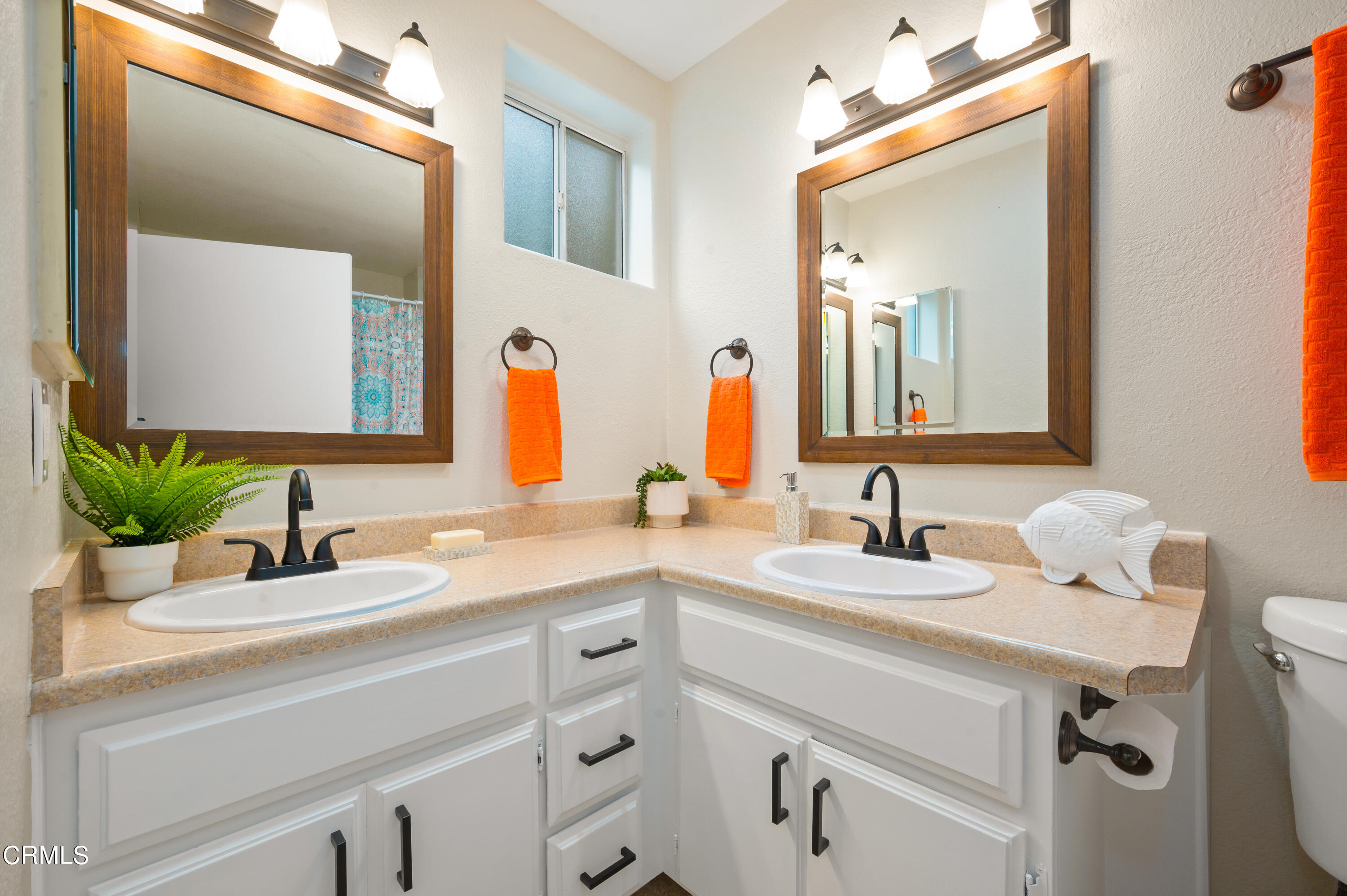 6140 Monterey Road, Unit 220 Los Angeles, CA 90042 - Photo 20 of 43 a bathroom with a sink and a mirror