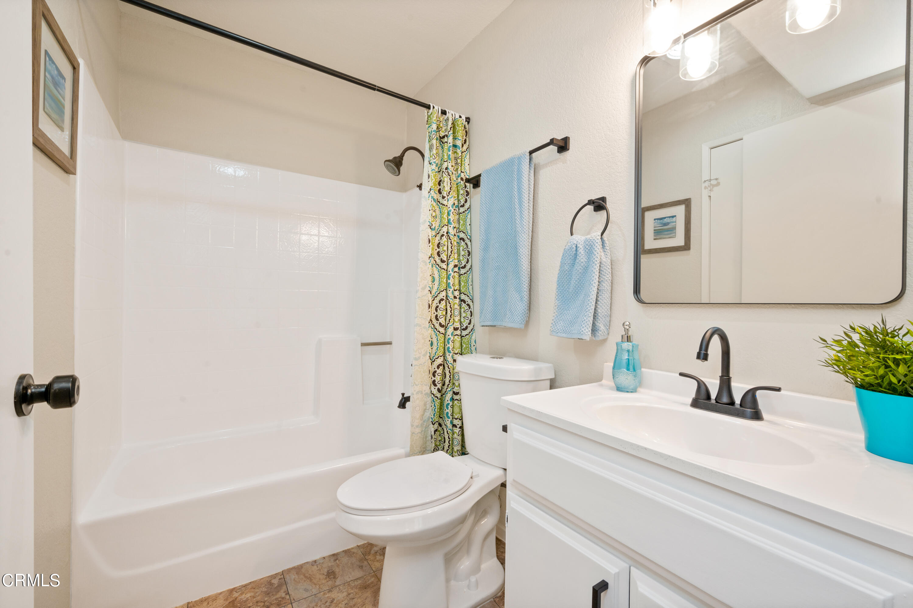 6140 Monterey Road, Unit 220 Los Angeles, CA 90042 - Photo 26 of 43 a bathroom with a sink toilet and shower