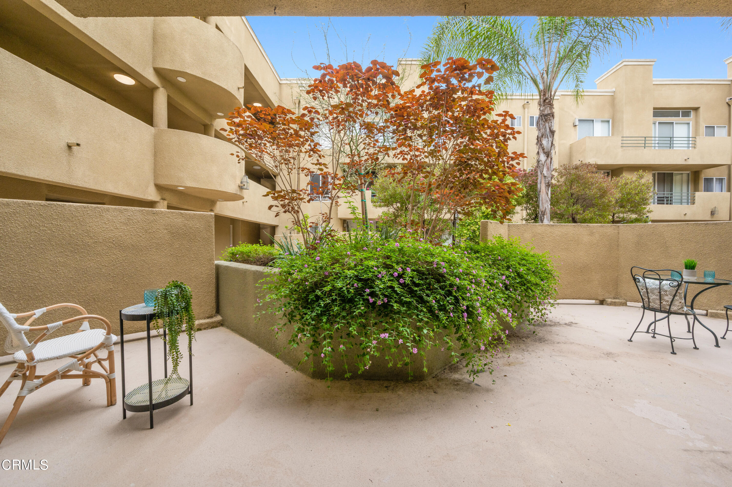 6140 Monterey Road, Unit 220 Los Angeles, CA 90042 - Photo 27 of 43 a view of a chairs and table in the balcony