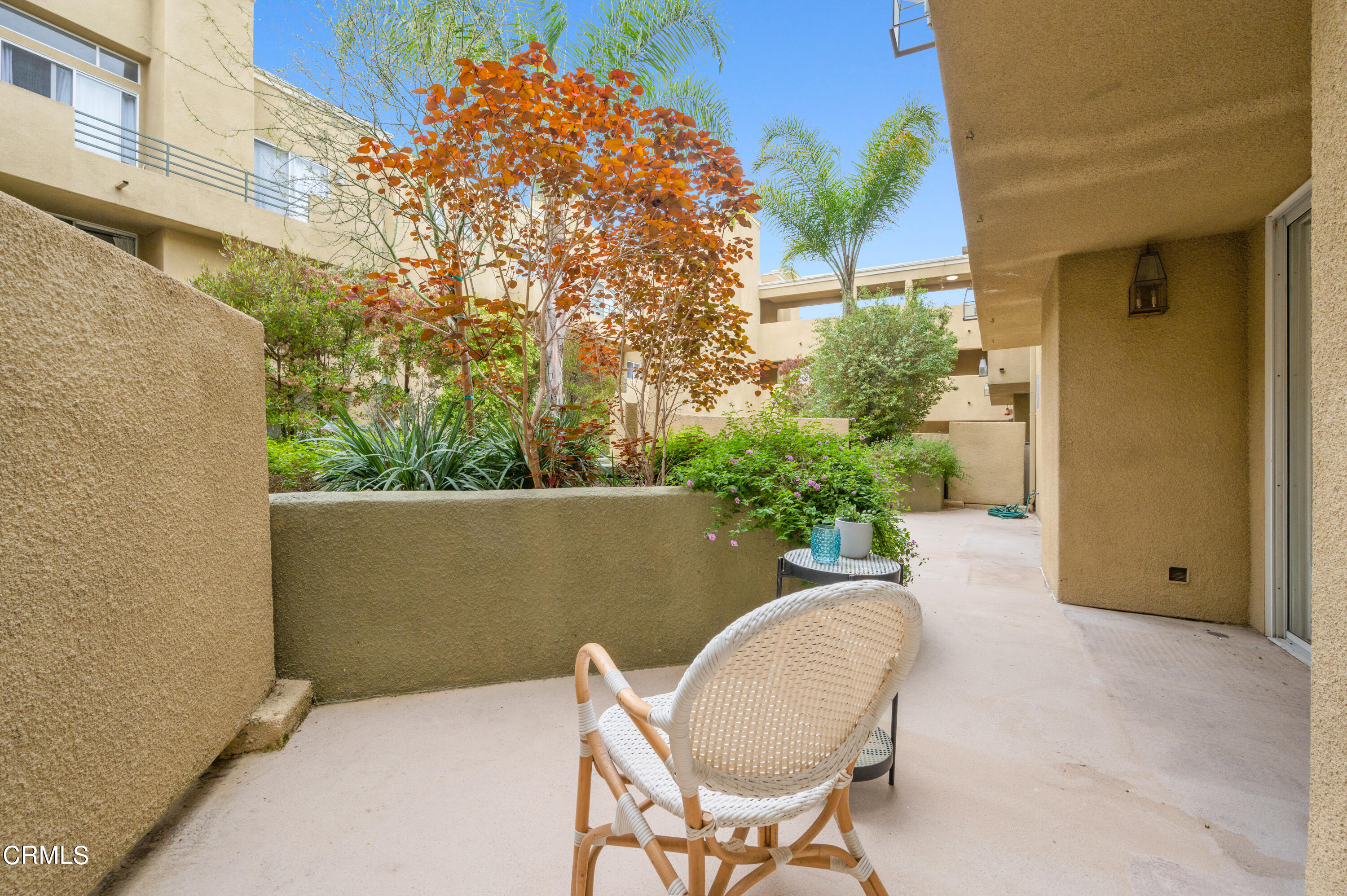 6140 Monterey Road, Unit 220 Los Angeles, CA 90042 - Photo 29 of 43 a backyard of a house with outdoor seating