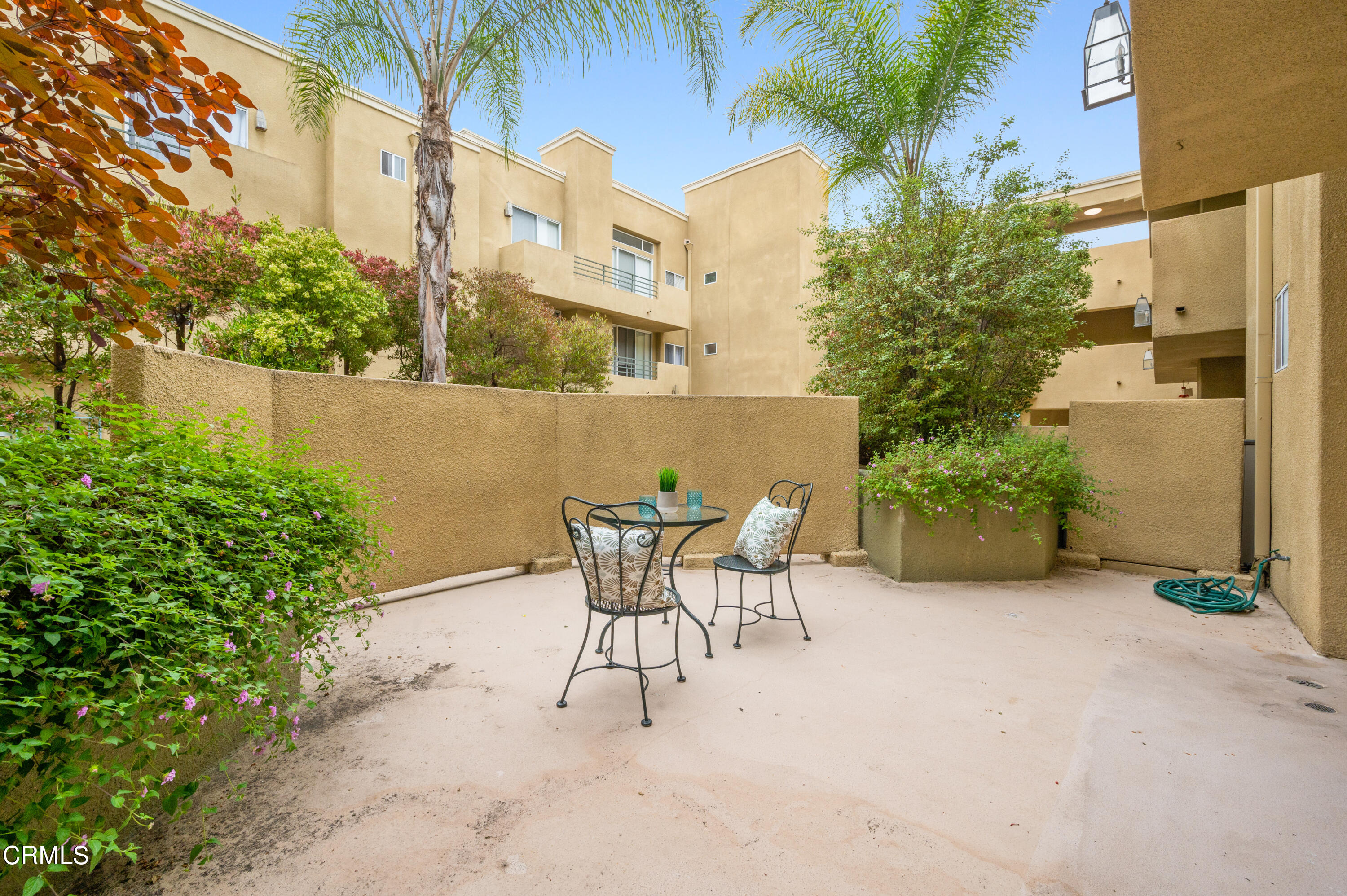6140 Monterey Road, Unit 220 Los Angeles, CA 90042 - Photo 30 of 43 a view of a chairs and table in the patio