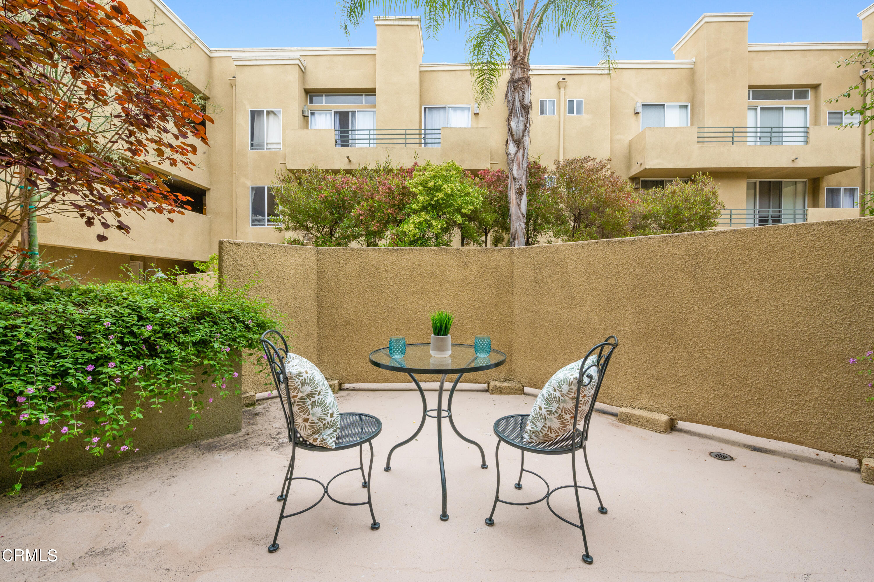 6140 Monterey Road, Unit 220 Los Angeles, CA 90042 - Photo 31 of 43 a view of balcony with chairs and potted plants