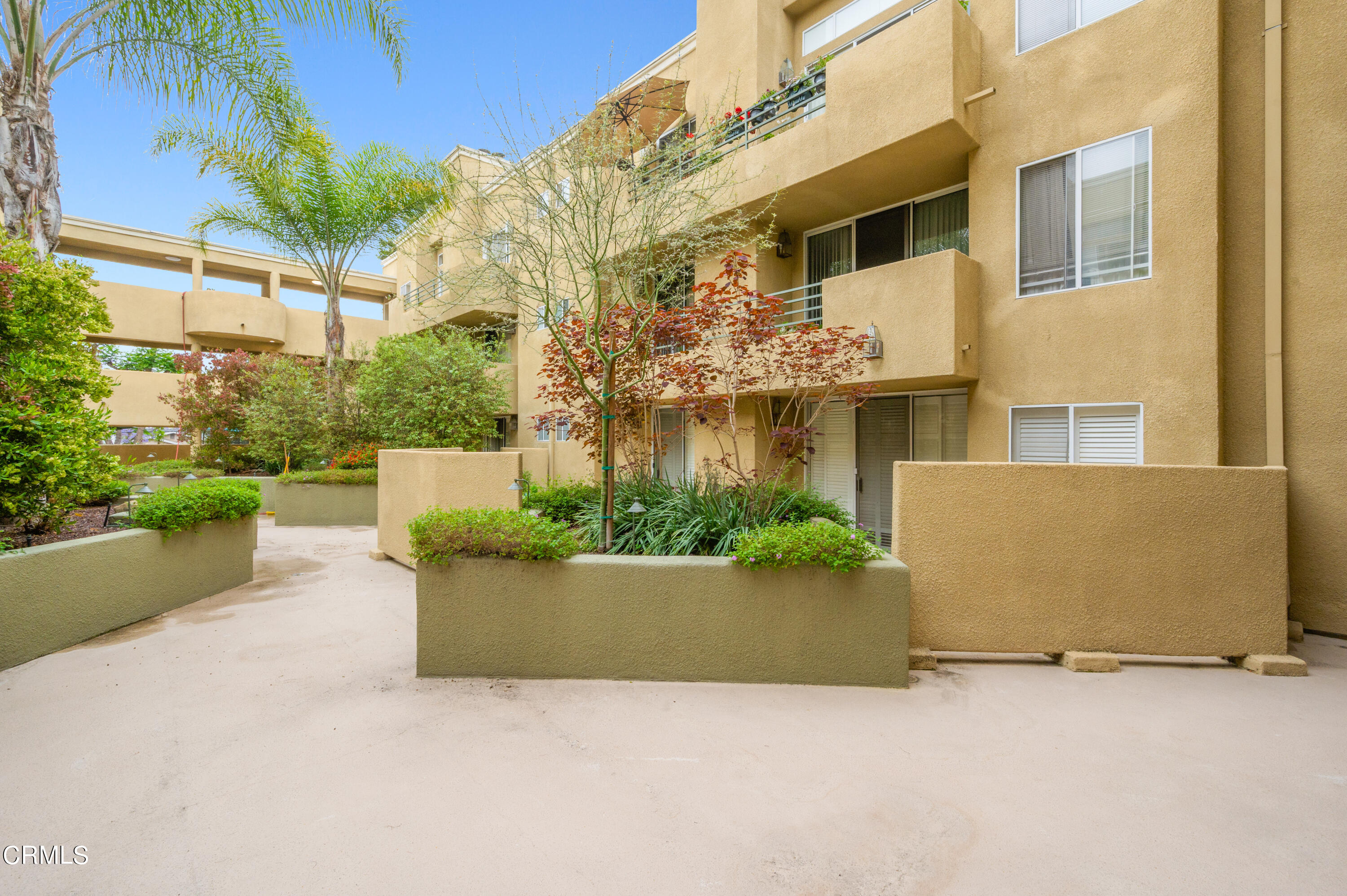 6140 Monterey Road, Unit 220 Los Angeles, CA 90042 - Photo 34 of 43 front view of a house with a yard