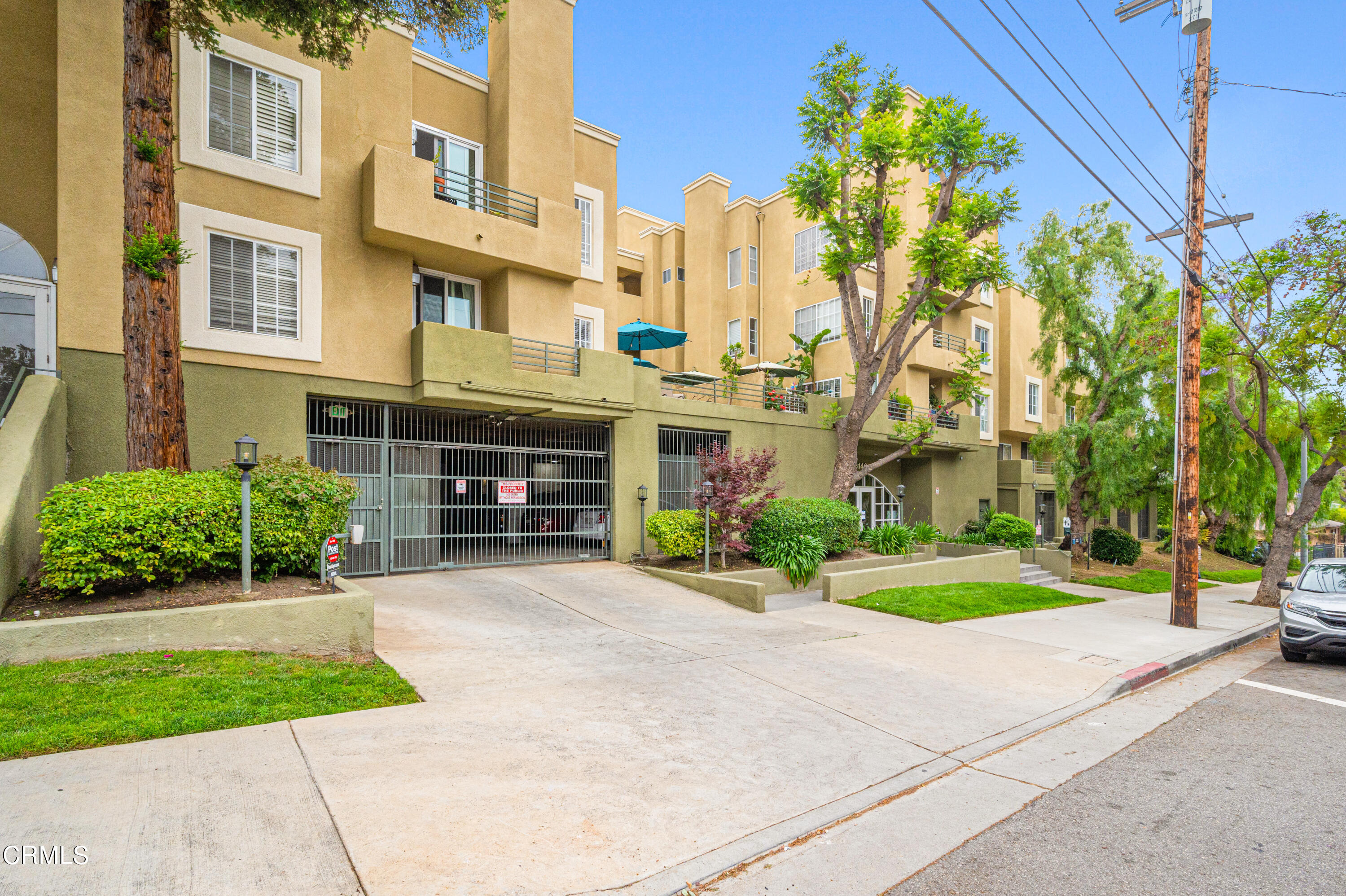 6140 Monterey Road, Unit 220 Los Angeles, CA 90042 - Photo 4 of 43 a front view of a building with garden