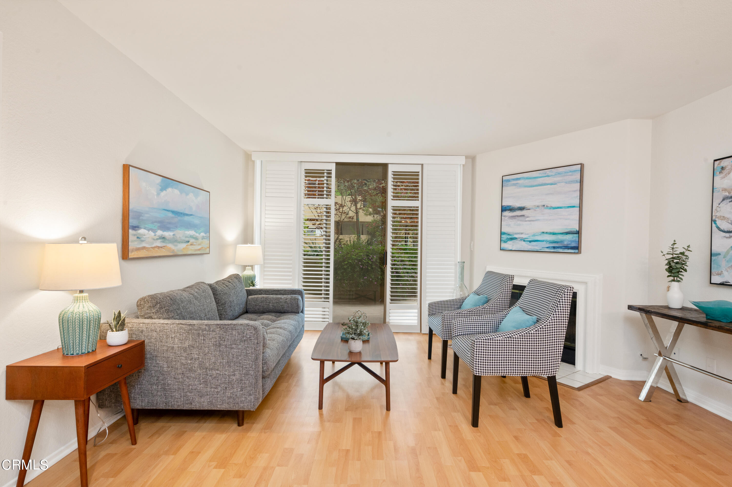 6140 Monterey Road, Unit 220 Los Angeles, CA 90042 - Photo 7 of 43 a living room with furniture and a wooden floor