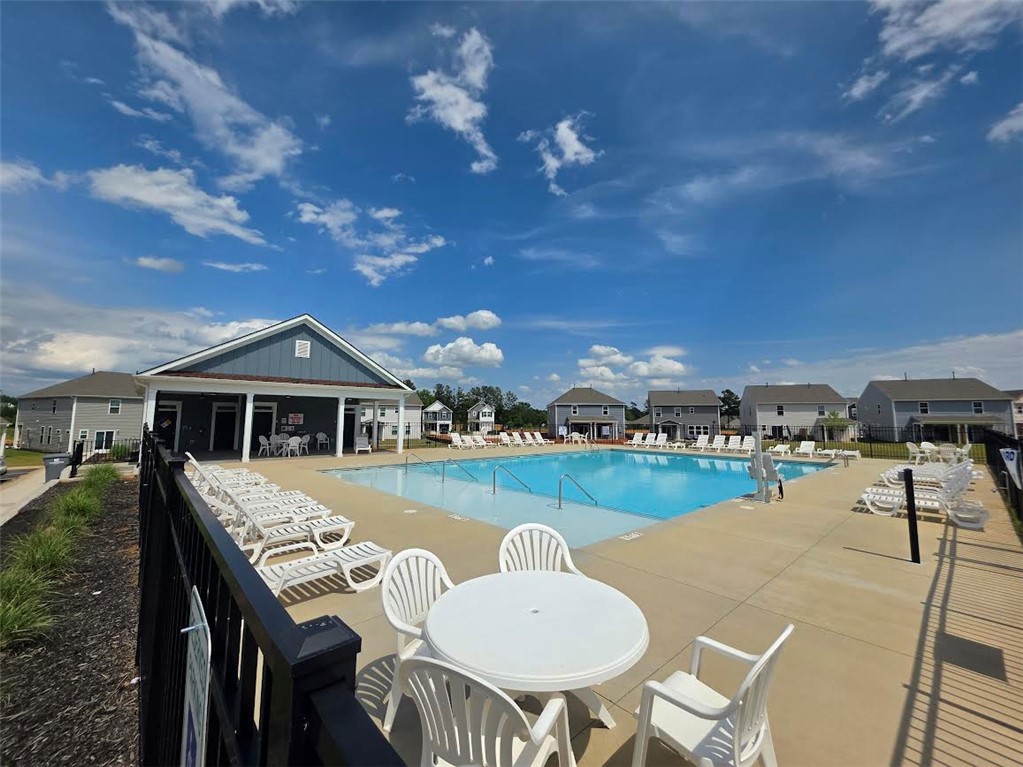 312 Phillips Drive Pendleton, SC 29670 - Photo 41 of 45 Enjoy sunny days by the refreshing community pool, complete with ample lounge seating.