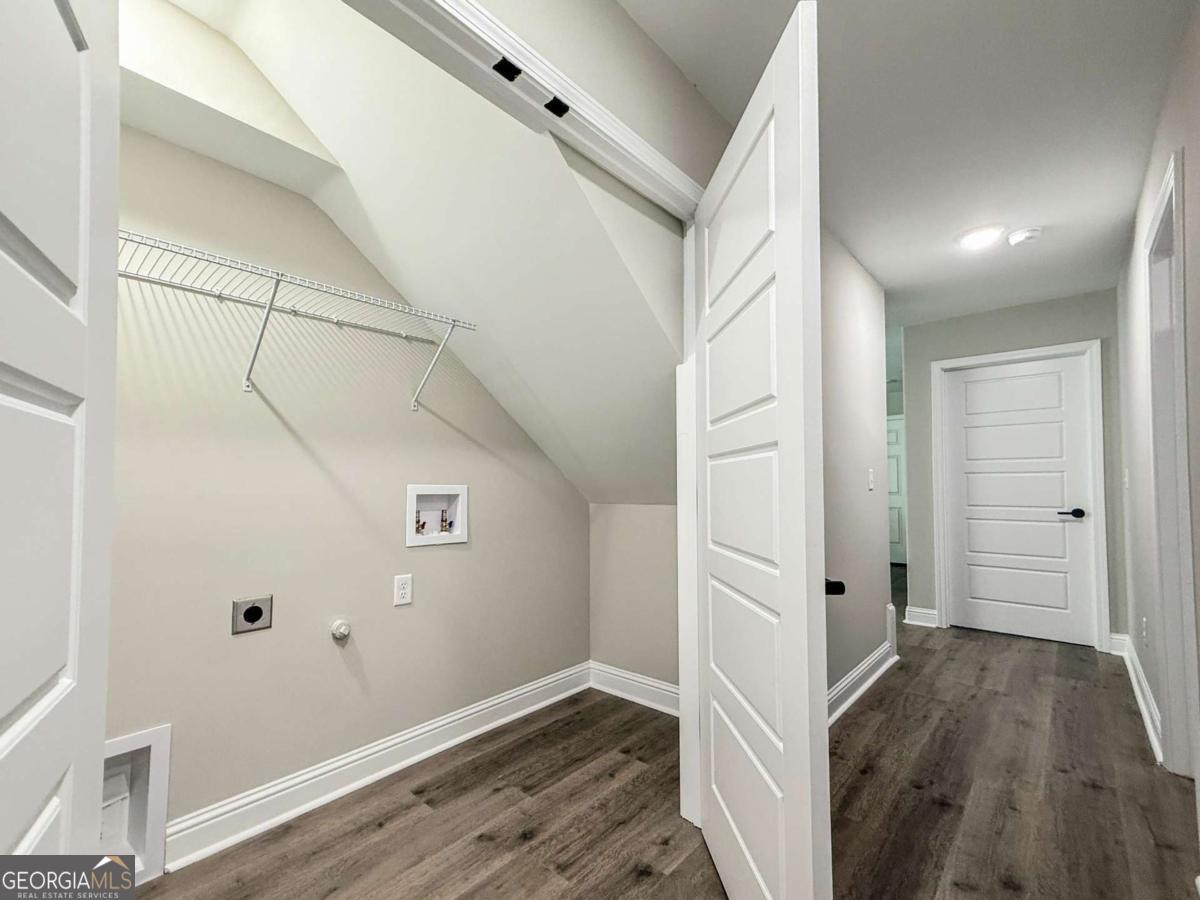 411 Madison Avenue St. Marys, GA 31558 - Photo 16 of 41 an empty room with wooden floor and entrance