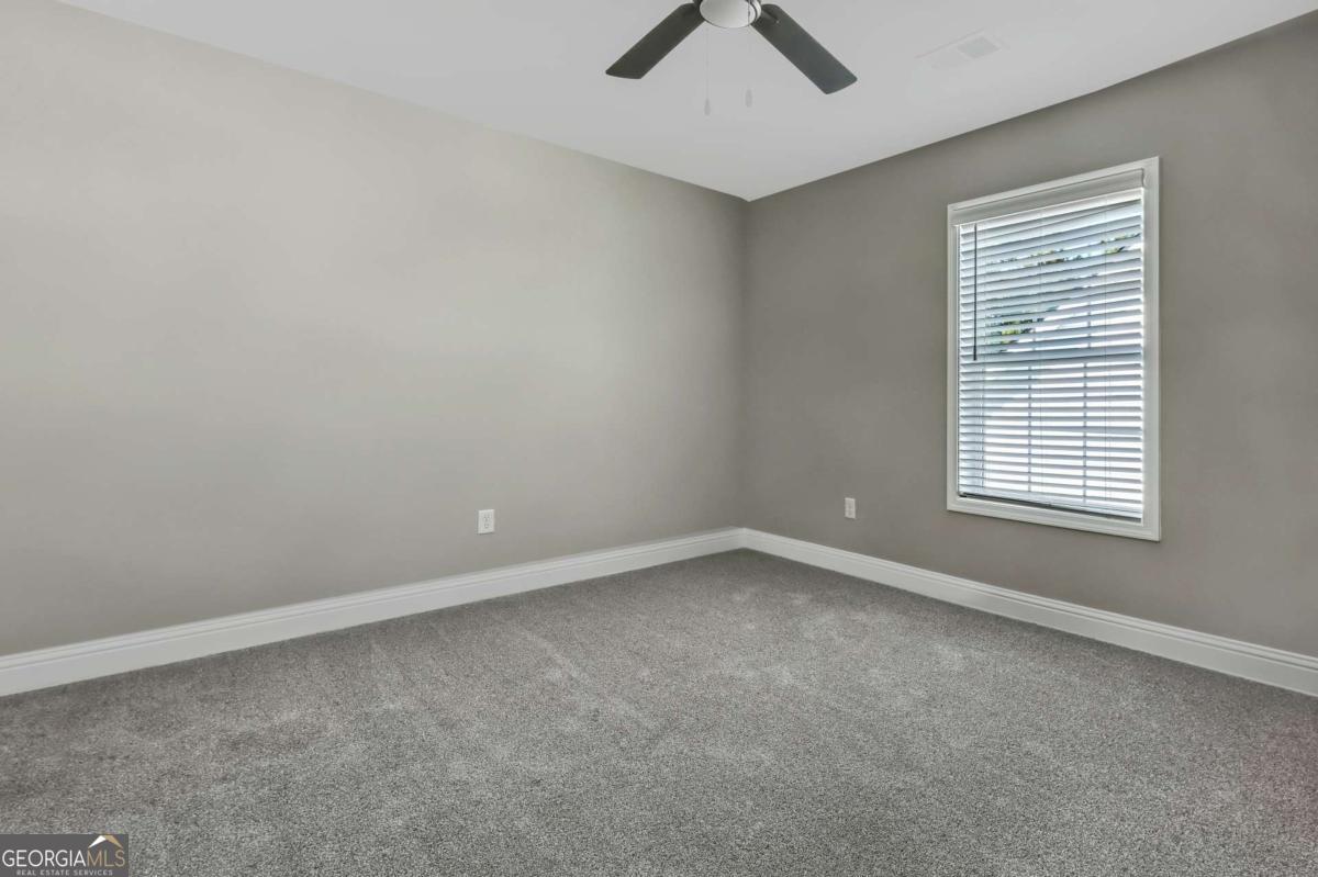 411 Madison Avenue St. Marys, GA 31558 - Photo 20 of 41 an empty room with a window