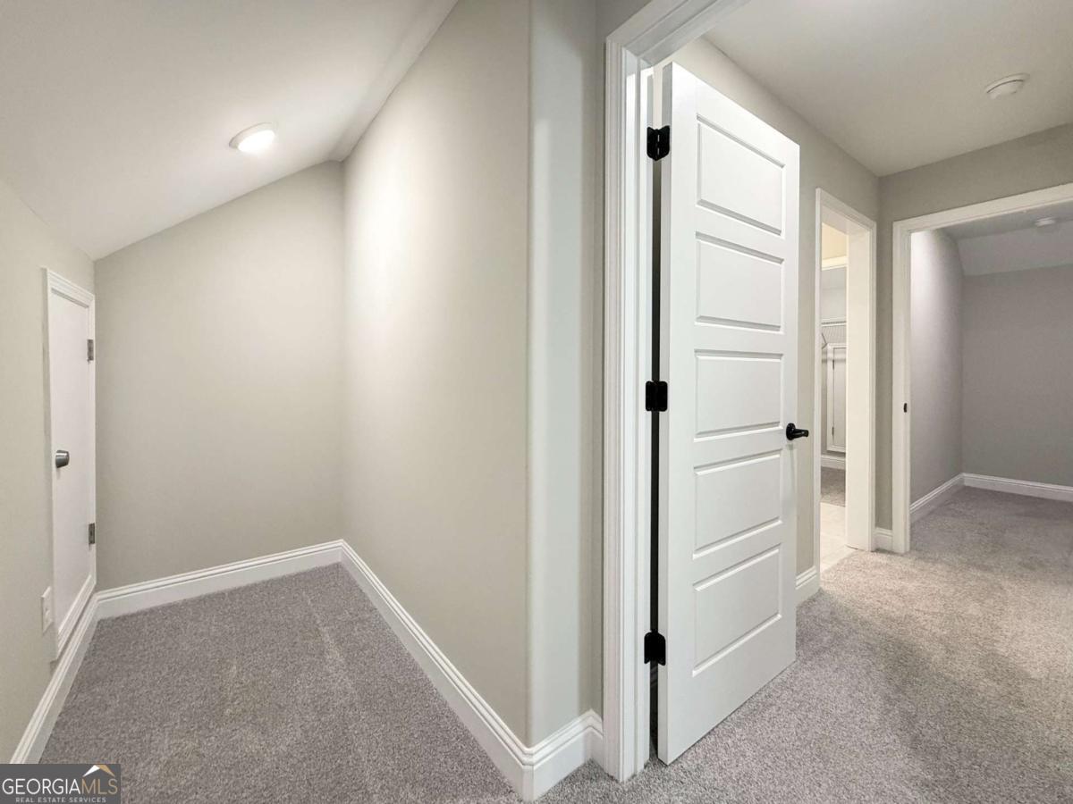 411 Madison Avenue St. Marys, GA 31558 - Photo 21 of 41 a view of a hallway with closet area
