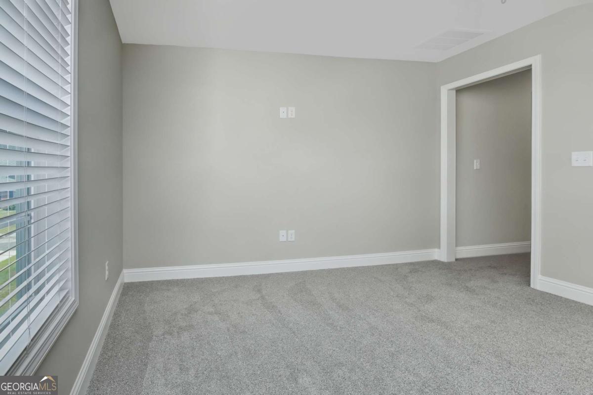 411 Madison Avenue St. Marys, GA 31558 - Photo 23 of 41 a view of an empty room