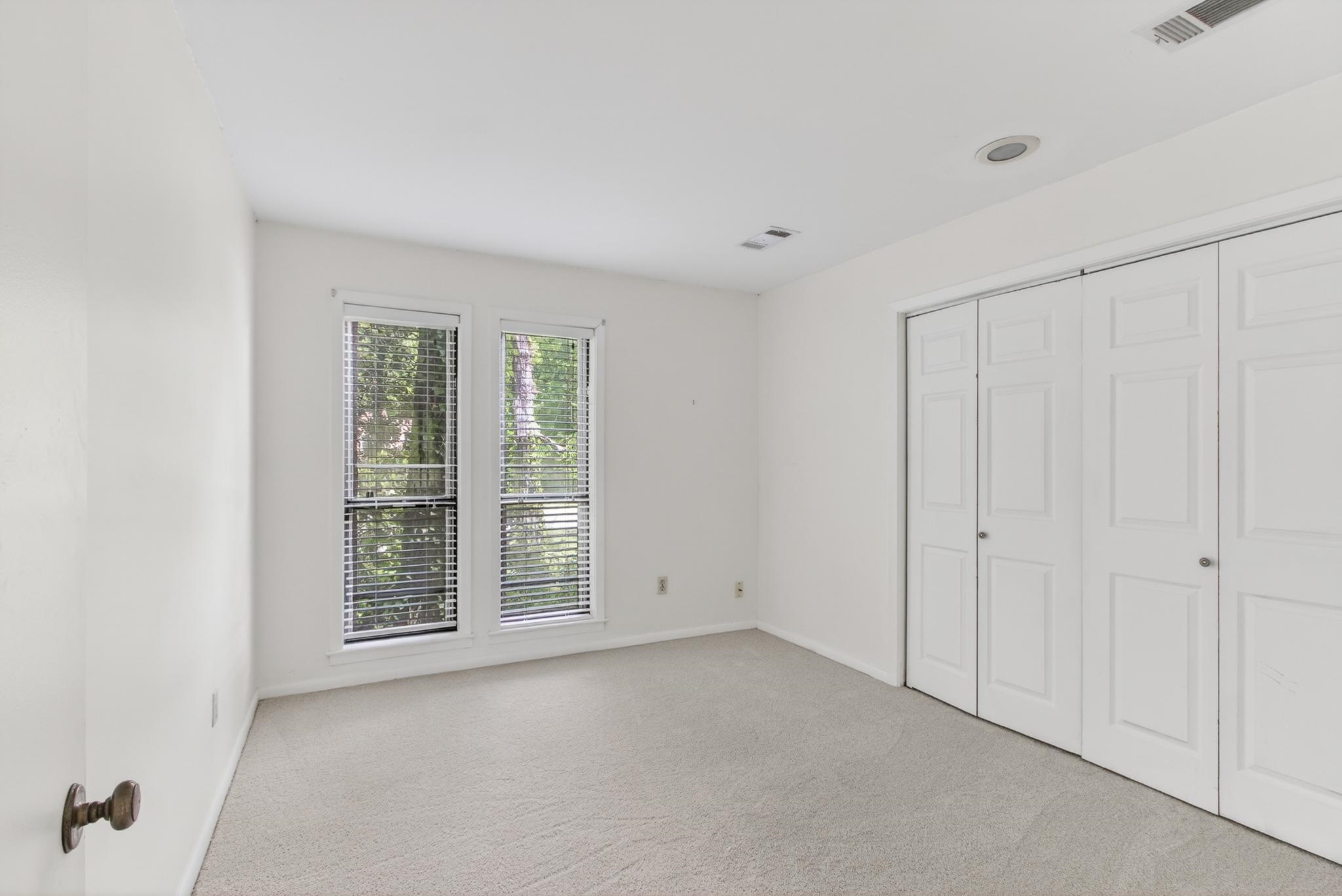 3121 Beechrun Drive Memphis, TN 38128 - Photo 33 of 40 The fourth bedroom also offers views of the north side landscape, and offers two double closets!