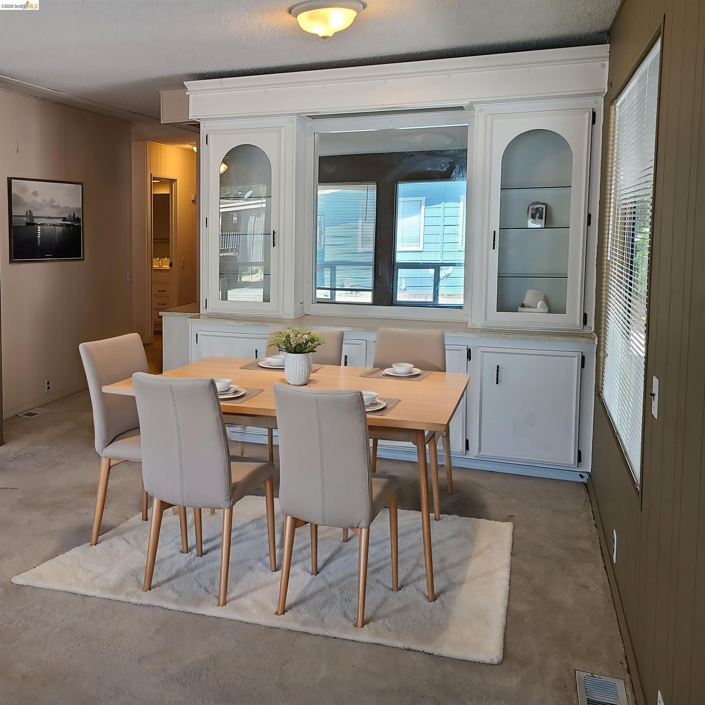 50 Leo Lane, Unit 50 Antioch, CA 94509 - Photo 11 of 64 a dining room with furniture and window