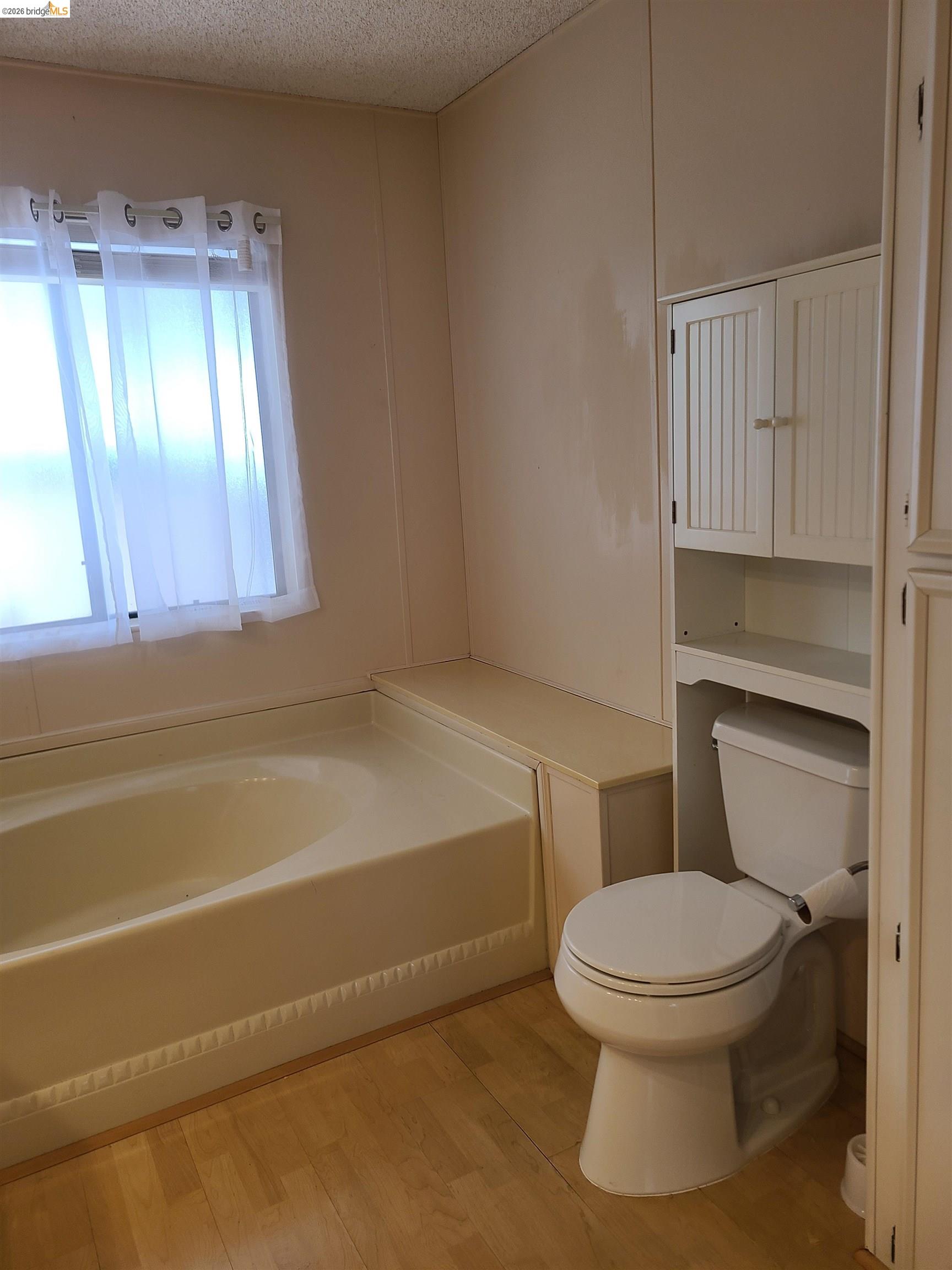 50 Leo Lane, Unit 50 Antioch, CA 94509 - Photo 33 of 64 a bathroom with a toilet a sink and bathtub