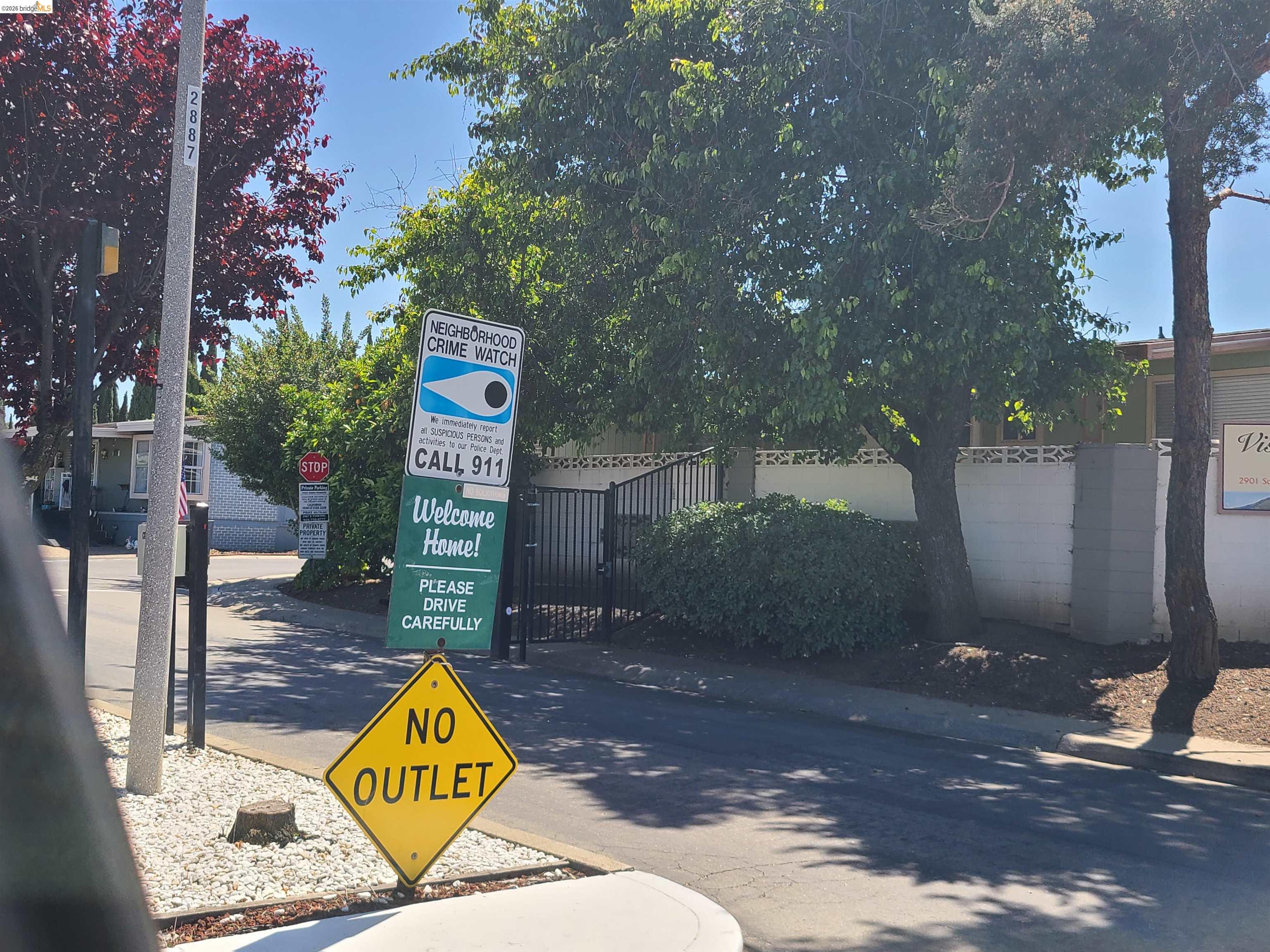 50 Leo Lane, Unit 50 Antioch, CA 94509 - Photo 51 of 64 a view of a sign board with yard