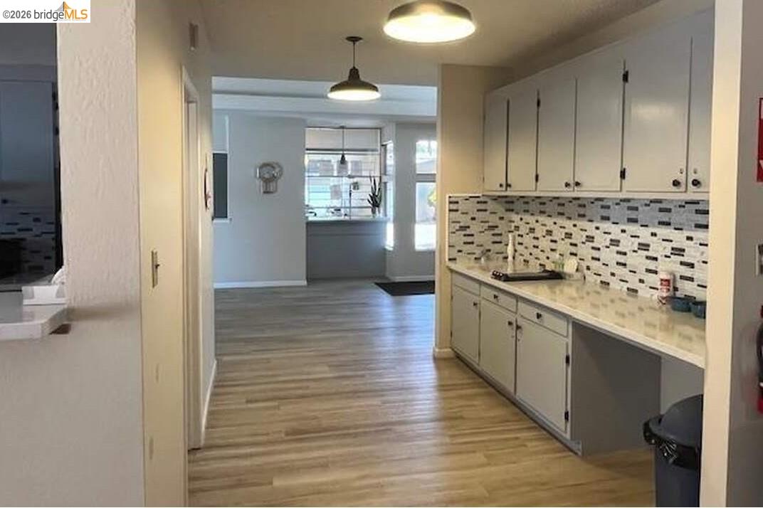 50 Leo Lane, Unit 50 Antioch, CA 94509 - Photo 58 of 64 a kitchen with granite countertop white cabinets and window