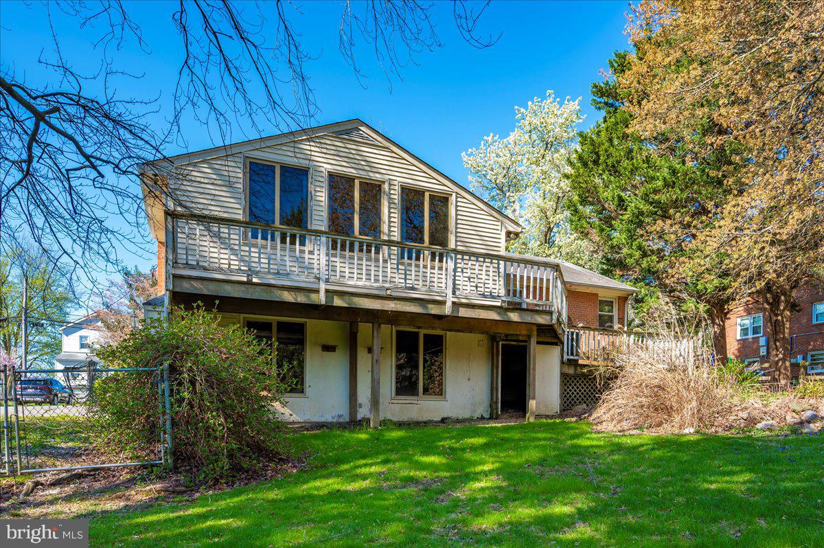 28317 Kemptown Road Damascus, MD 20872 - Photo 54 of 65 a front view of a house with a yard