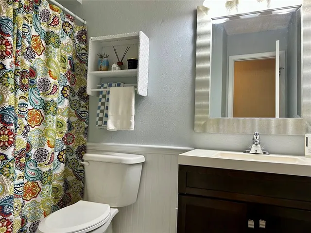 a bathroom with a bathtub and shower