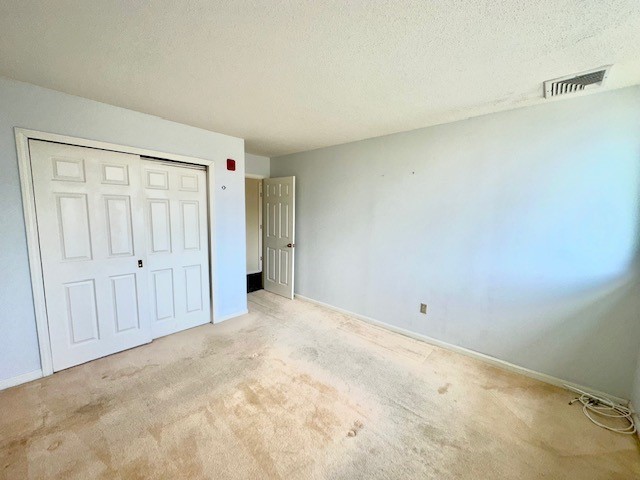 140 High Street, Unit 201 Westerly, RI 02891 - Photo 12 of 19 Primary bedroom with double closets
