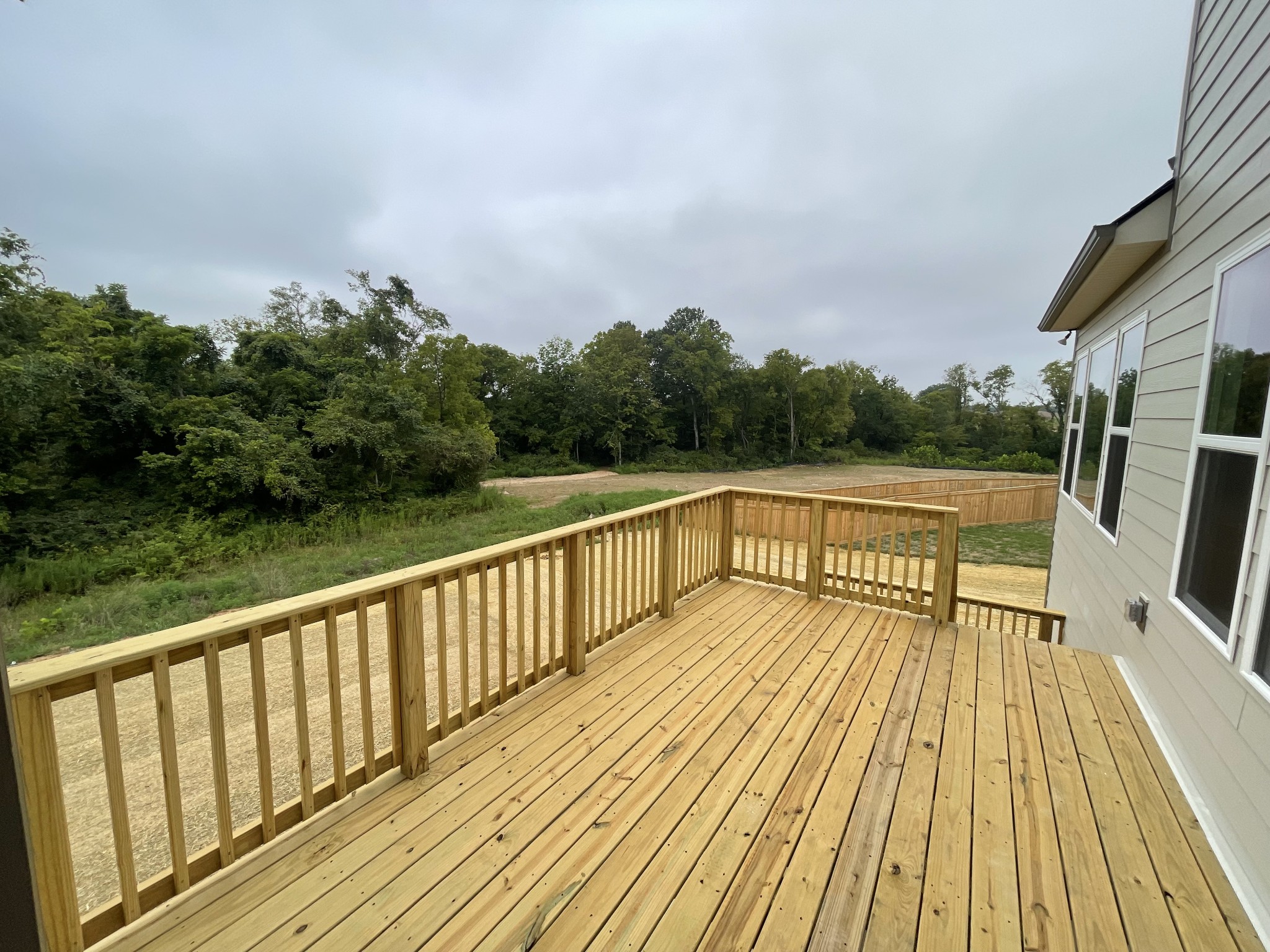 213 Phillips Bend Spring Hill, TN 37174 - Photo 16 of 49 a view of balcony with wooden floor and fence