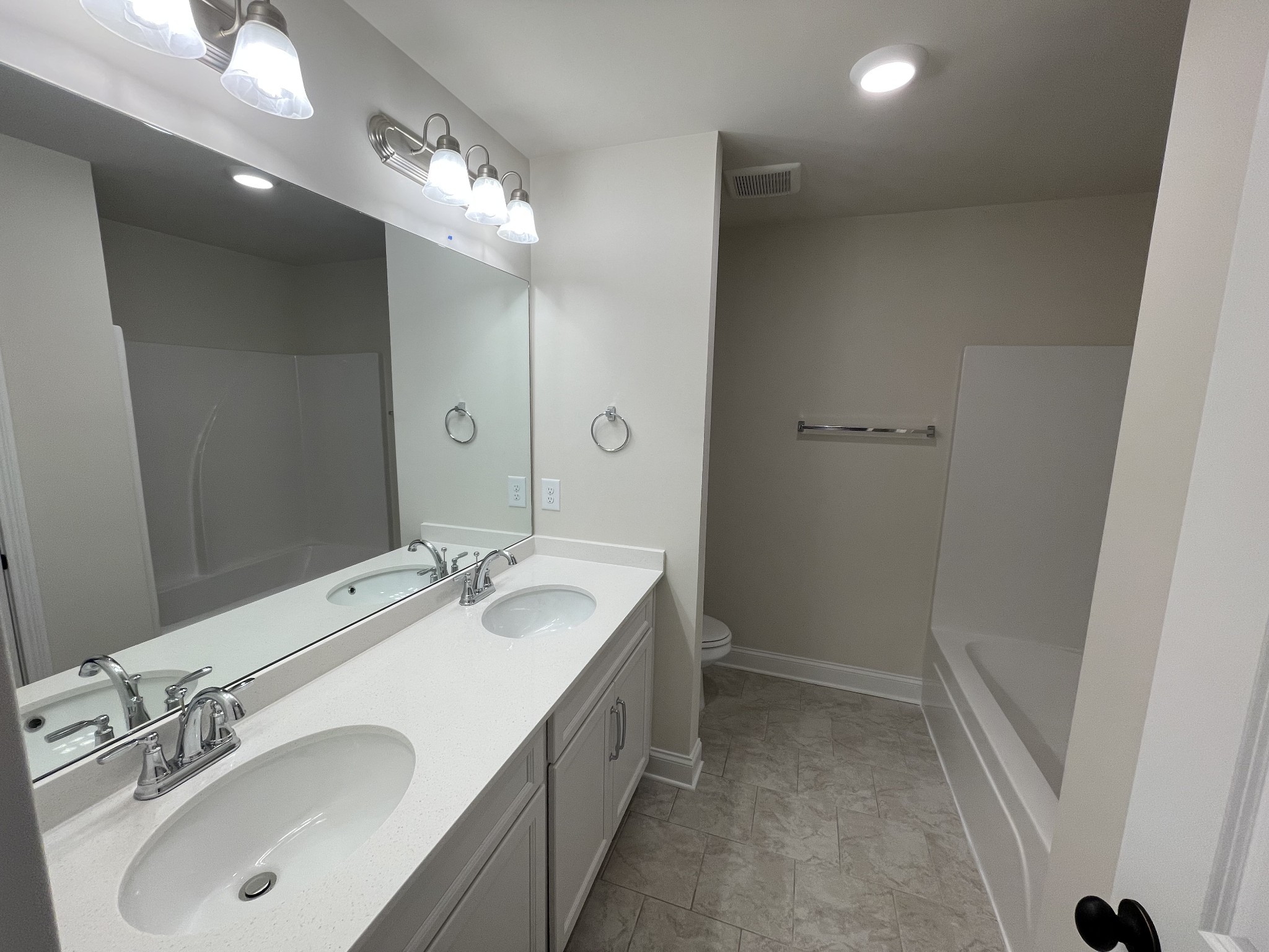 213 Phillips Bend Spring Hill, TN 37174 - Photo 31 of 49 a bathroom with a sink and a mirror