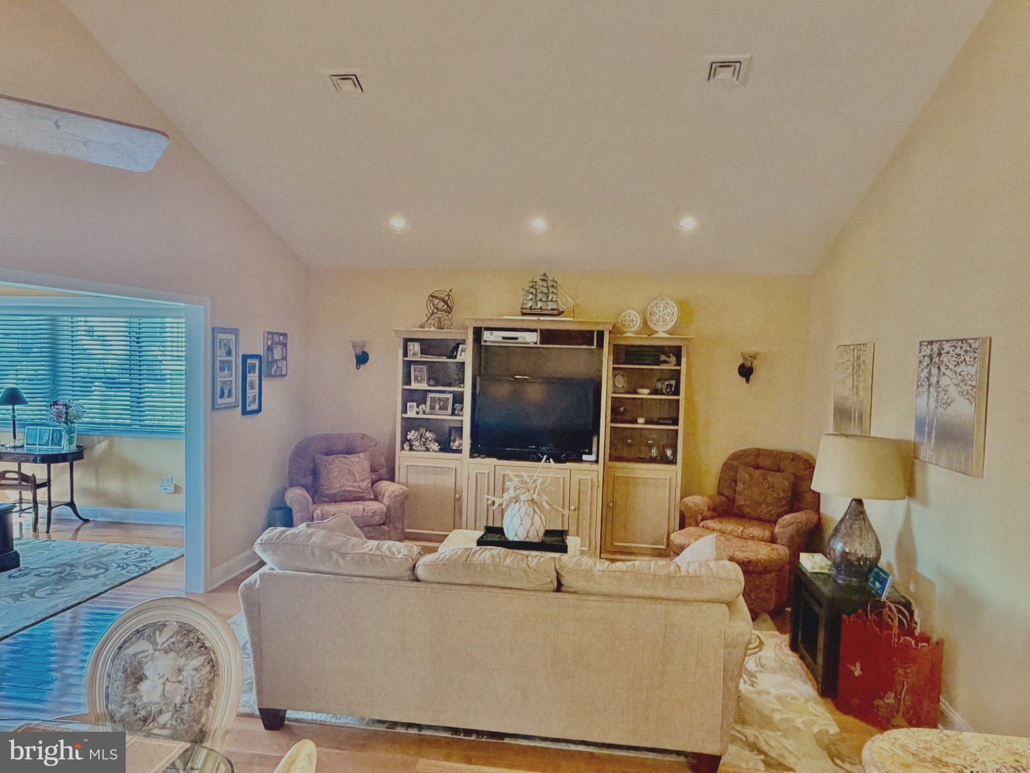 211 William Cook Boulevard Manahawkin, NJ 08050 - Photo 15 of 71 Inviting living space with warm tones.