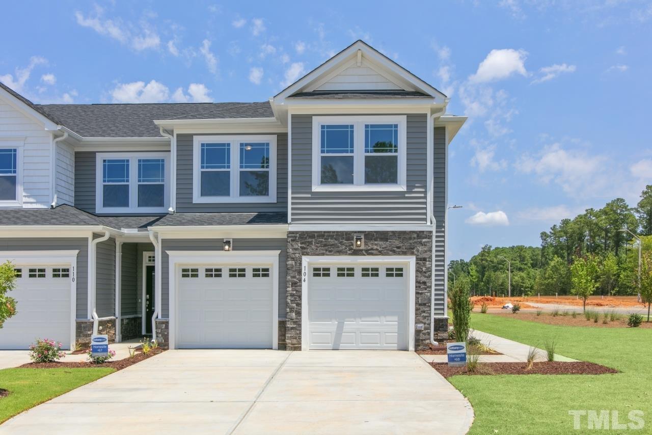 196 Lennei Lane Garner, NC 27529 - Photo 3 of 46 a front view of a house with a yard