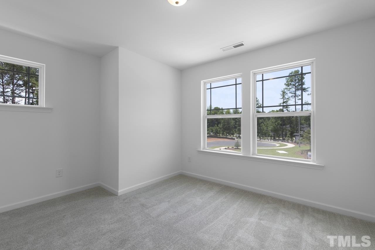 196 Lennei Lane Garner, NC 27529 - Photo 38 of 46 an empty room with a window